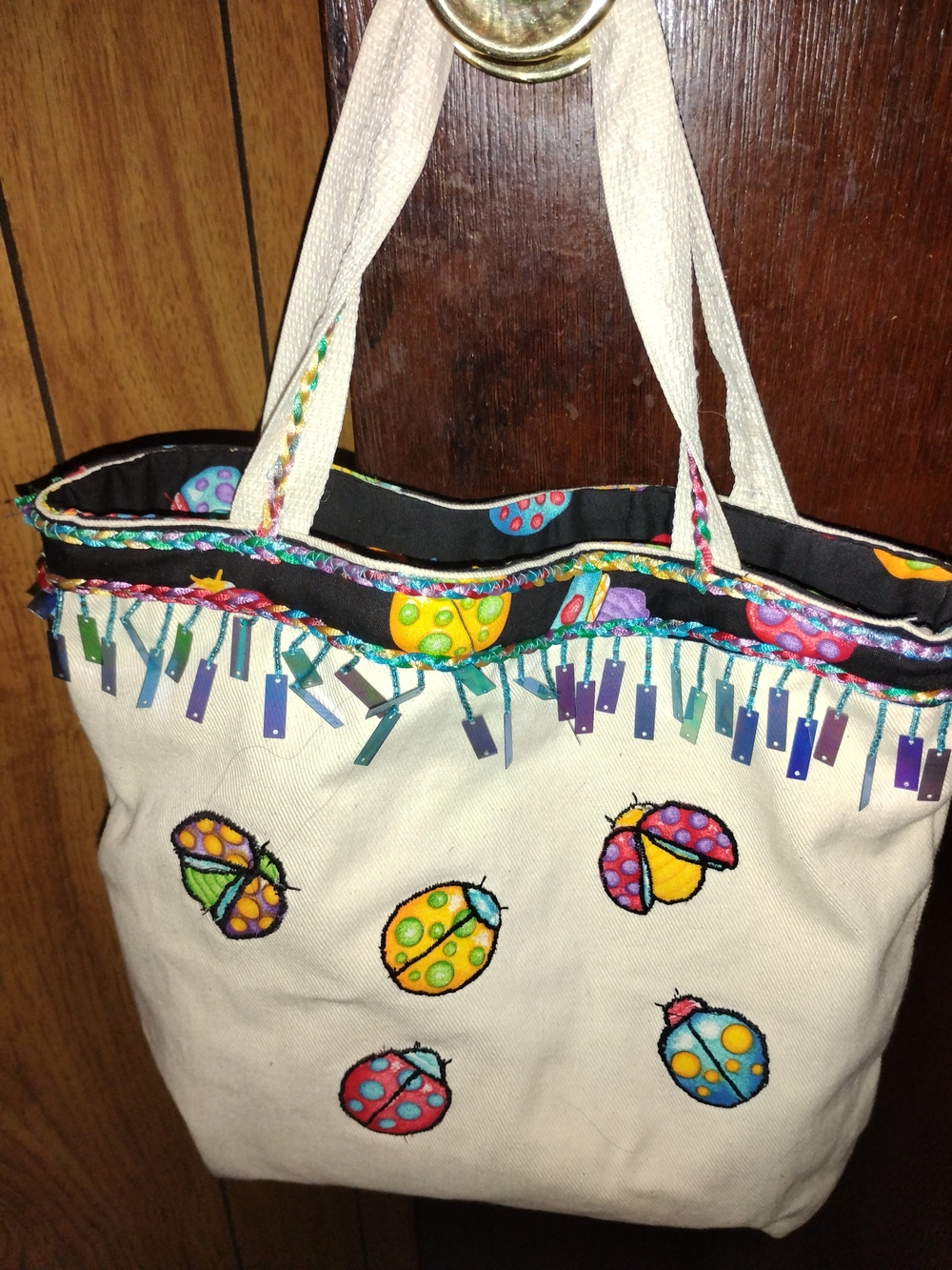 Embroidered Cream Canvas Tote with Colorful Ladybug Accents